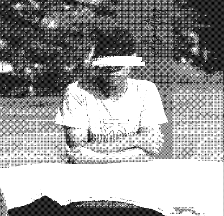 Monochrome dither art portrait of web developer Ismael Tang sitting outdoors with arms crossed.